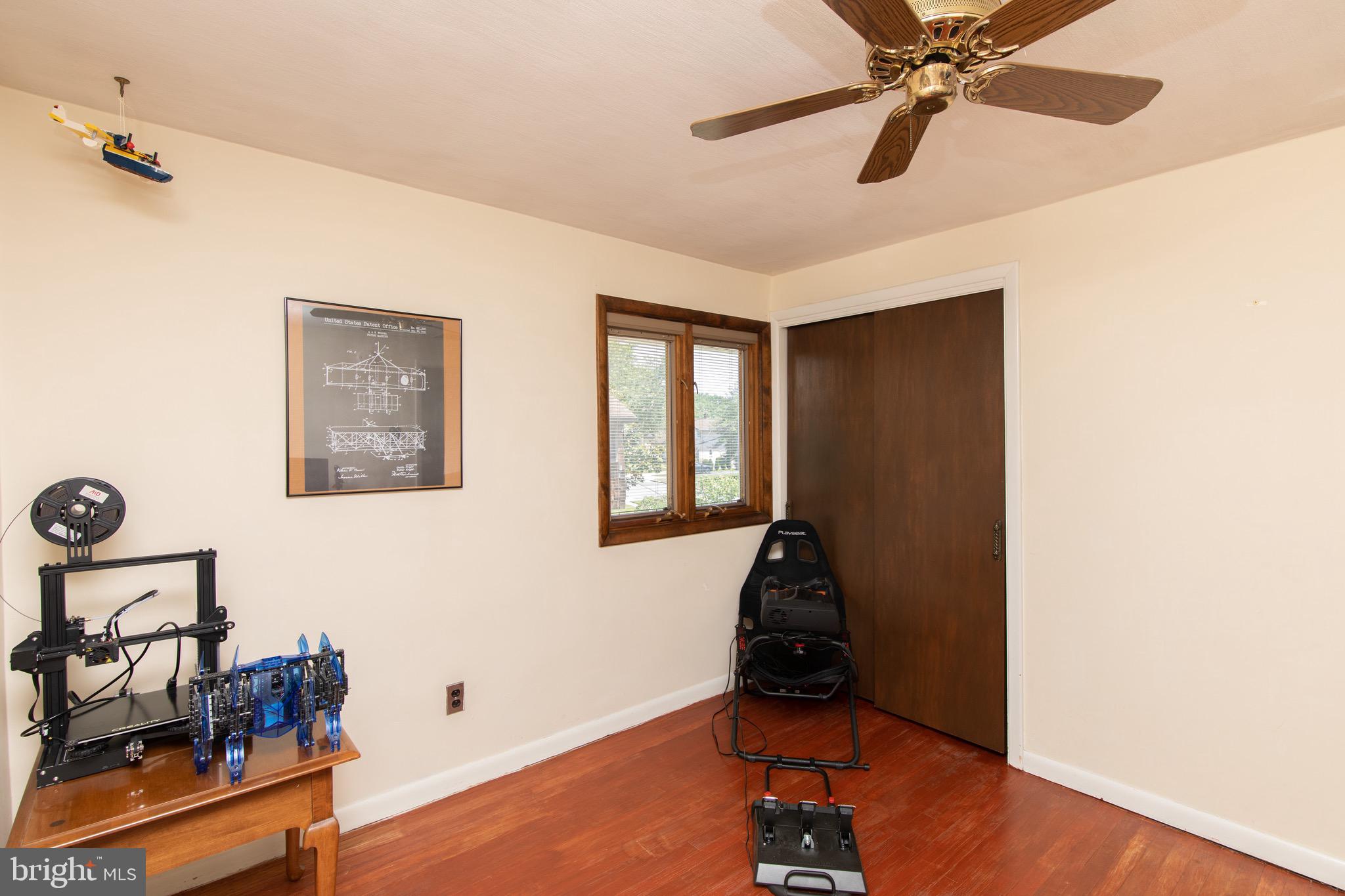 12 Brookmead Drive Cherry Hill, NJ 08034 - Photo 32 of 47 a bedroom with a bed and wooden floor