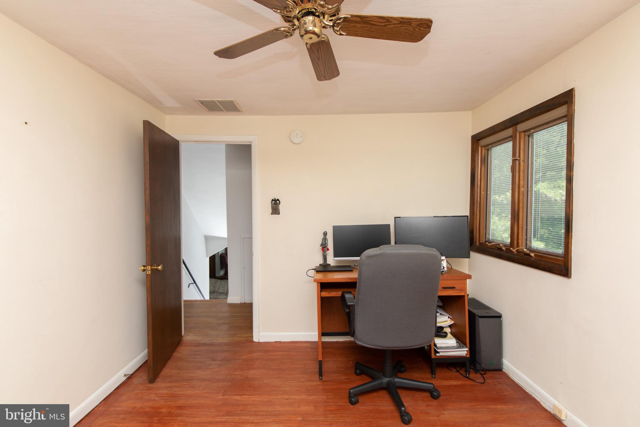 12 Brookmead Drive Cherry Hill, NJ 08034 - Photo 33 of 47 a workspace with furniture and a window