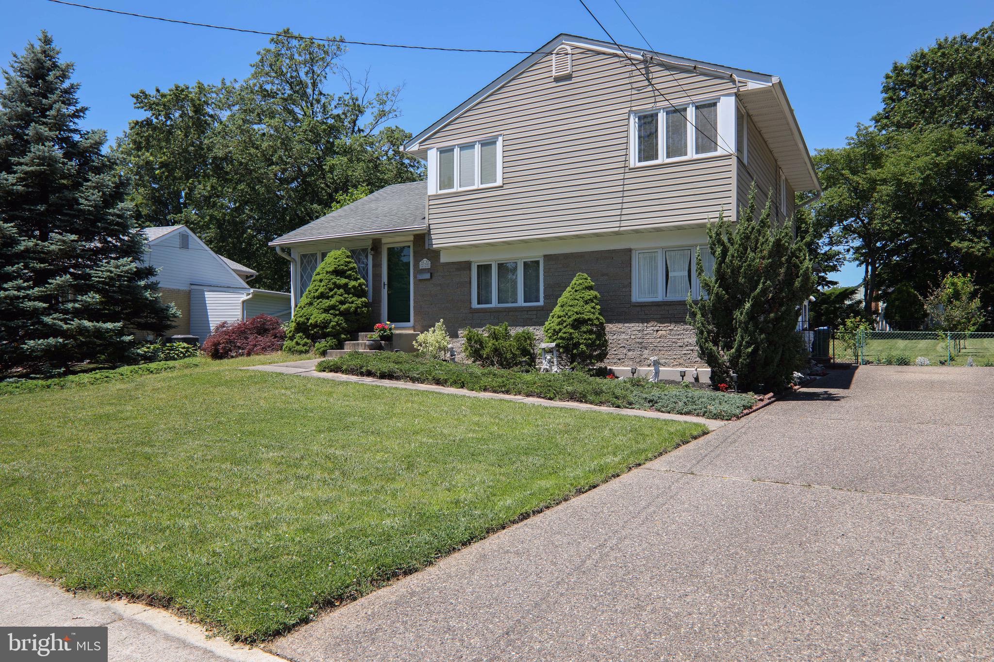 12 Brookmead Drive Cherry Hill, NJ 08034 - Photo 36 of 47 a front view of house with garden