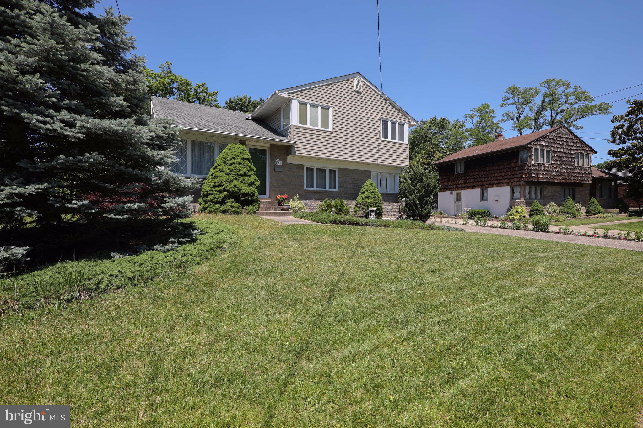 12 Brookmead Drive Cherry Hill, NJ 08034 - Photo 37 of 47 a front view of a house with garden