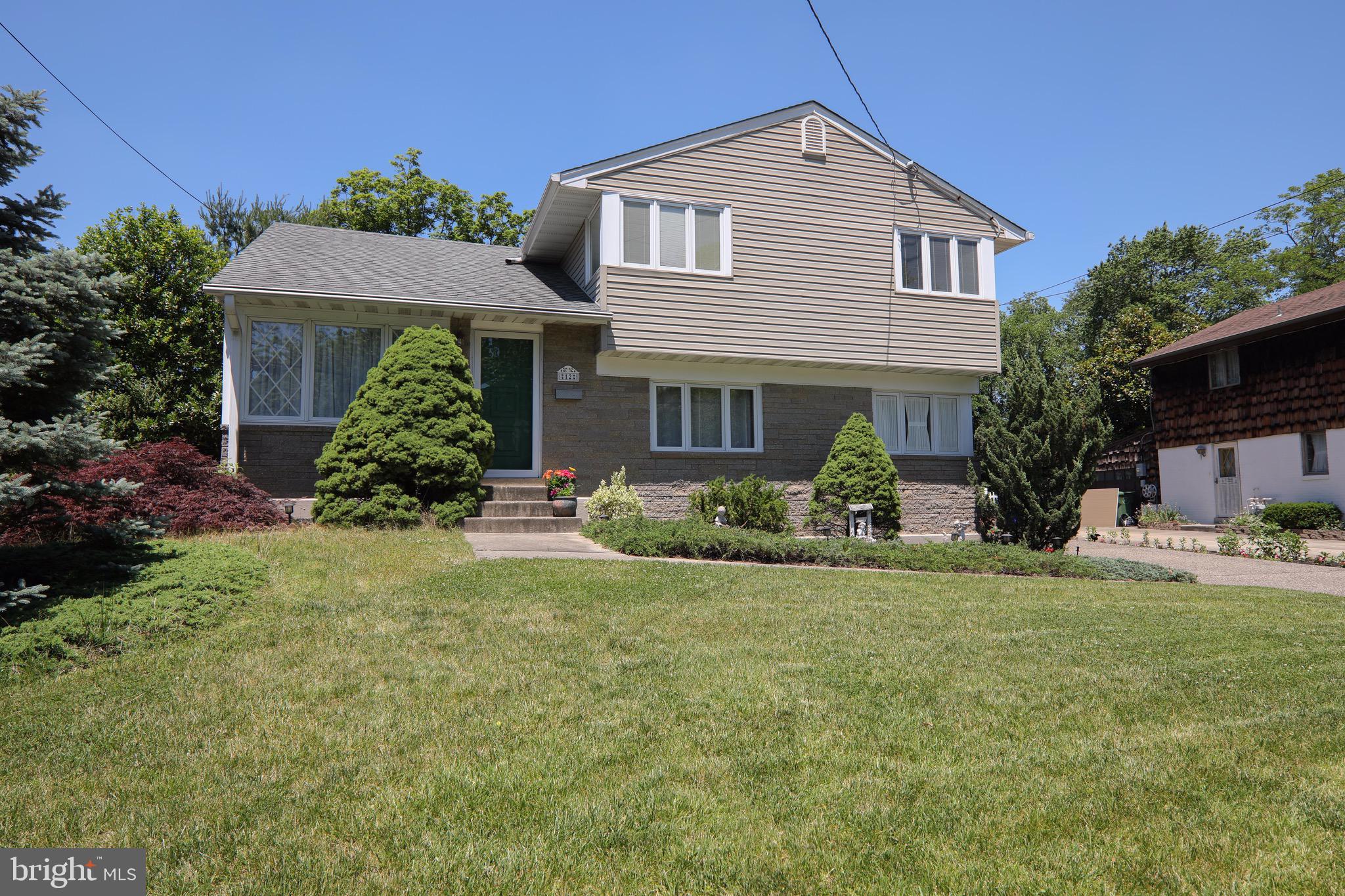 12 Brookmead Drive Cherry Hill, NJ 08034 - Photo 38 of 47 a front view of a house with a yard