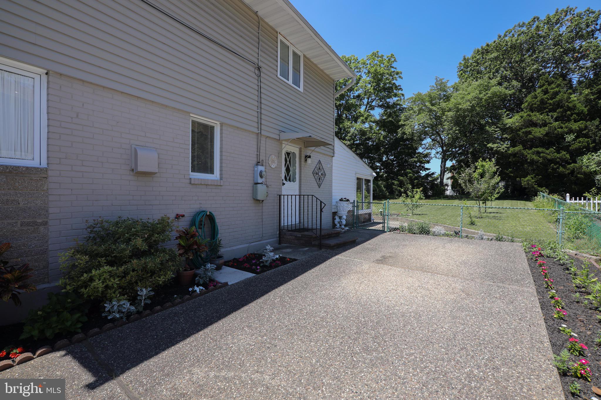 12 Brookmead Drive Cherry Hill, NJ 08034 - Photo 39 of 47 a backyard of a house with lots of green space