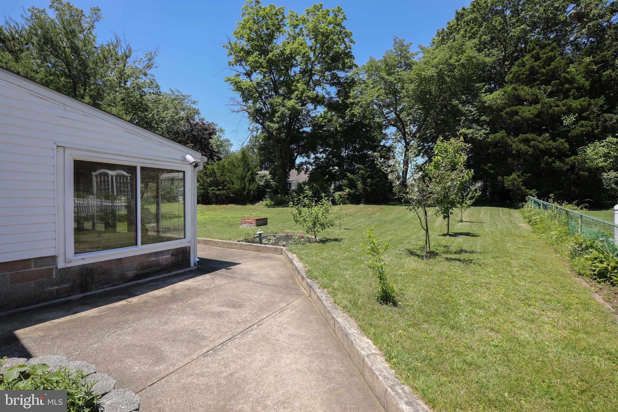 12 Brookmead Drive Cherry Hill, NJ 08034 - Photo 40 of 47 a view of a yard with plants and tree