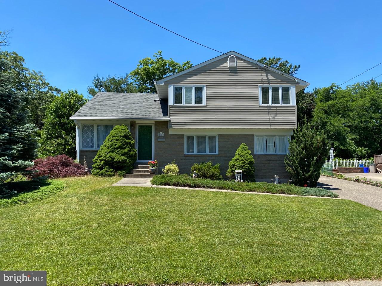 12 Brookmead Drive Cherry Hill, NJ 08034 - Photo 46 of 47 a front view of a house with a yard