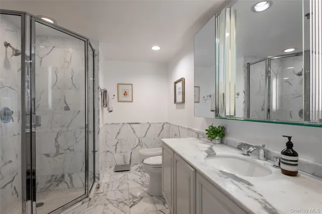 a bedroom with a bed and a table