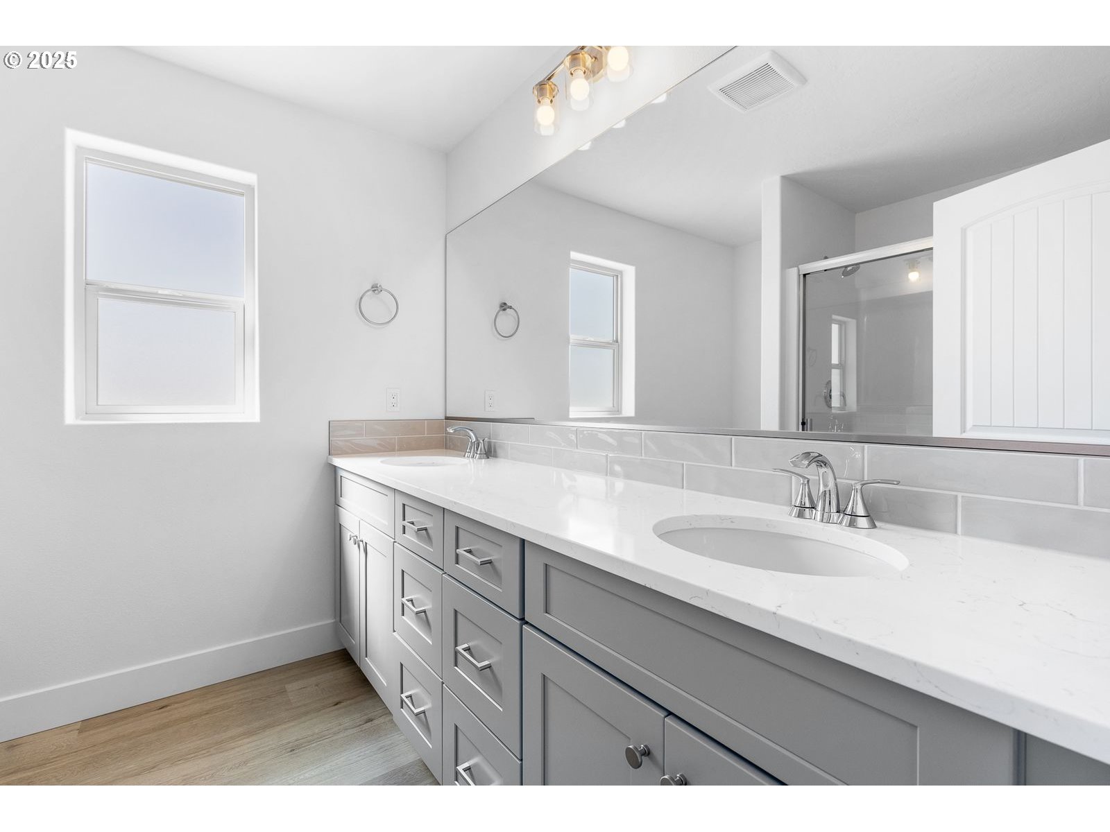 117 Tiber Street Boardman, OR 97818 - Photo 12 of 26 a bathroom with a sink a vanity and a mirror
