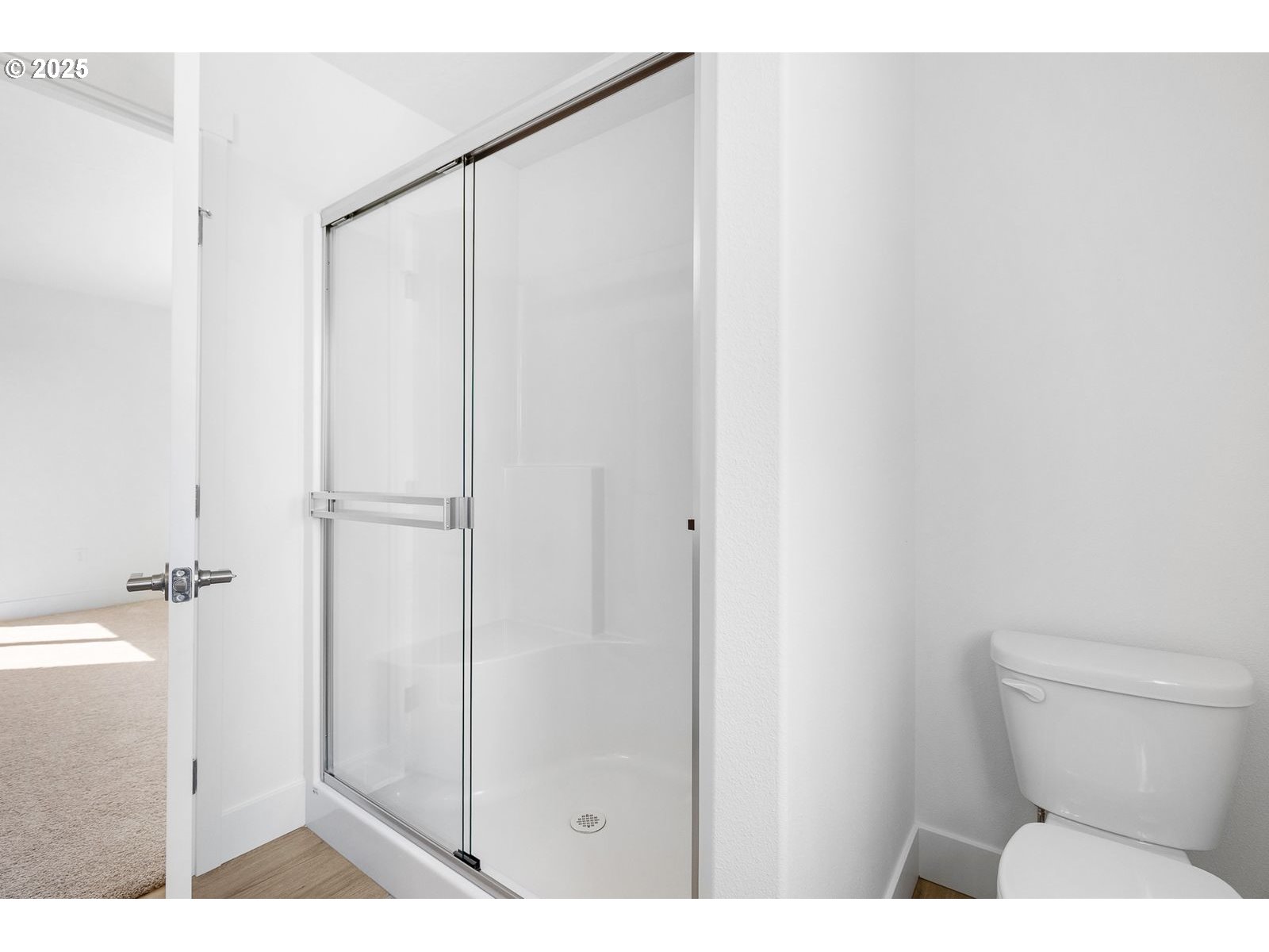 117 Tiber Street Boardman, OR 97818 - Photo 13 of 26 a bathroom with a shower a toilet and a sink