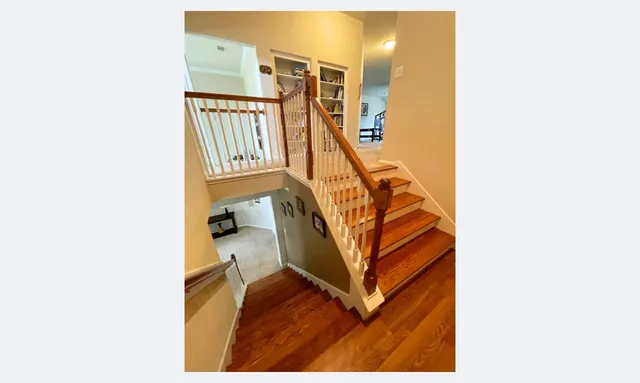 a view of entryway with stairs