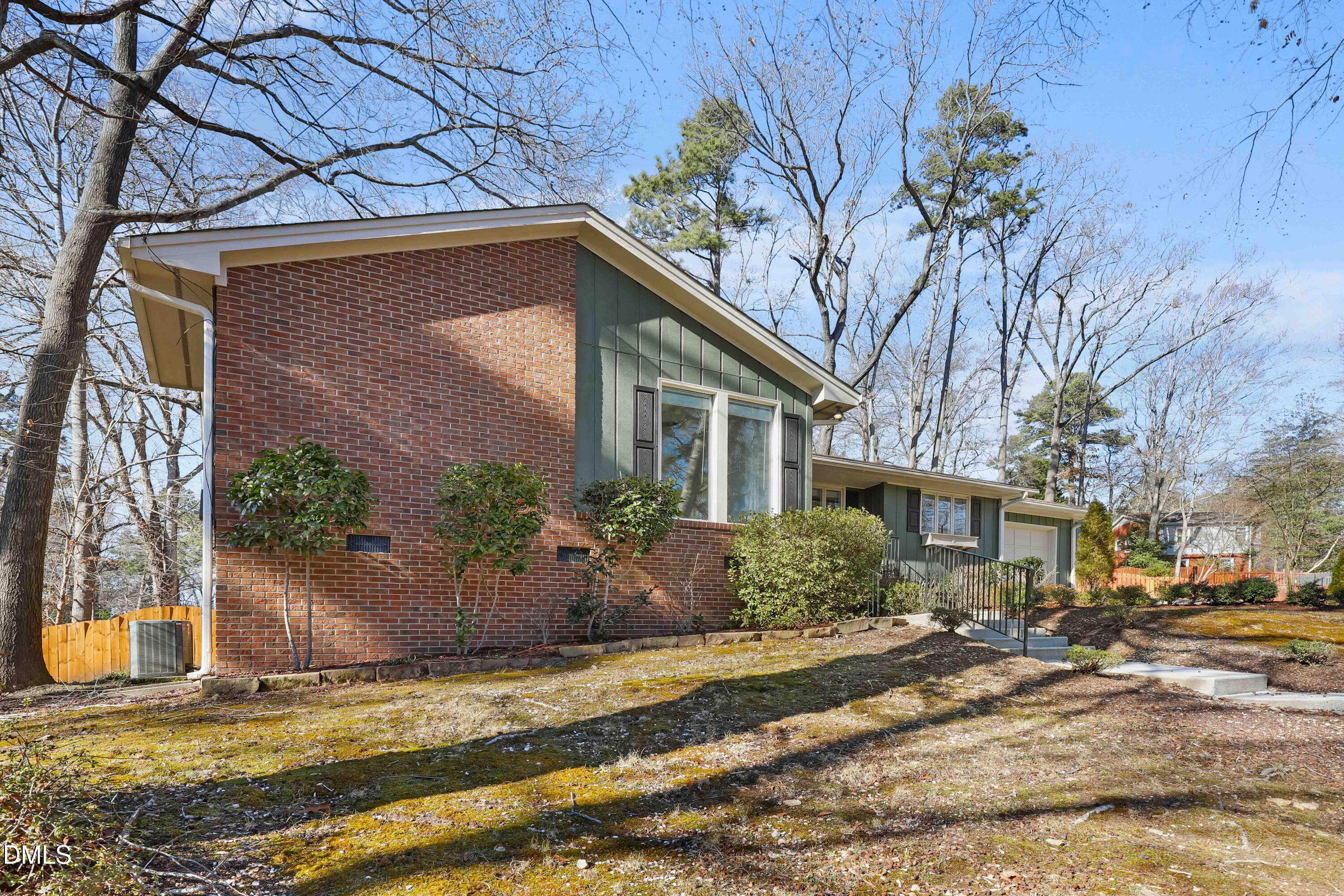 3504 Fairhill Drive Raleigh, NC 27612 - Photo 2 of 45 a view of a house with a yard