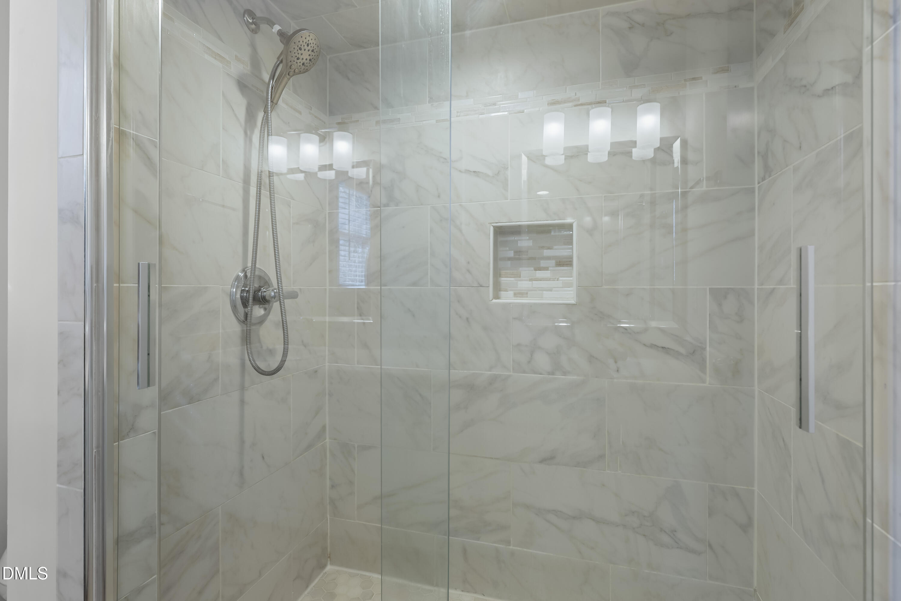 3504 Fairhill Drive Raleigh, NC 27612 - Photo 29 of 45 a bathroom with a glass shower door
