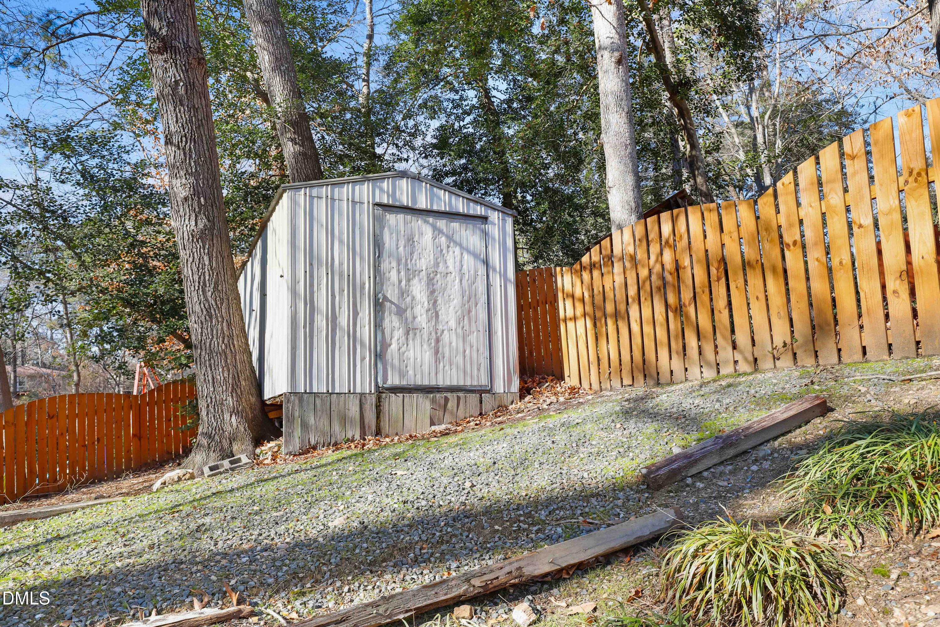 3504 Fairhill Drive Raleigh, NC 27612 - Photo 45 of 45 a view of a backyard with a fence