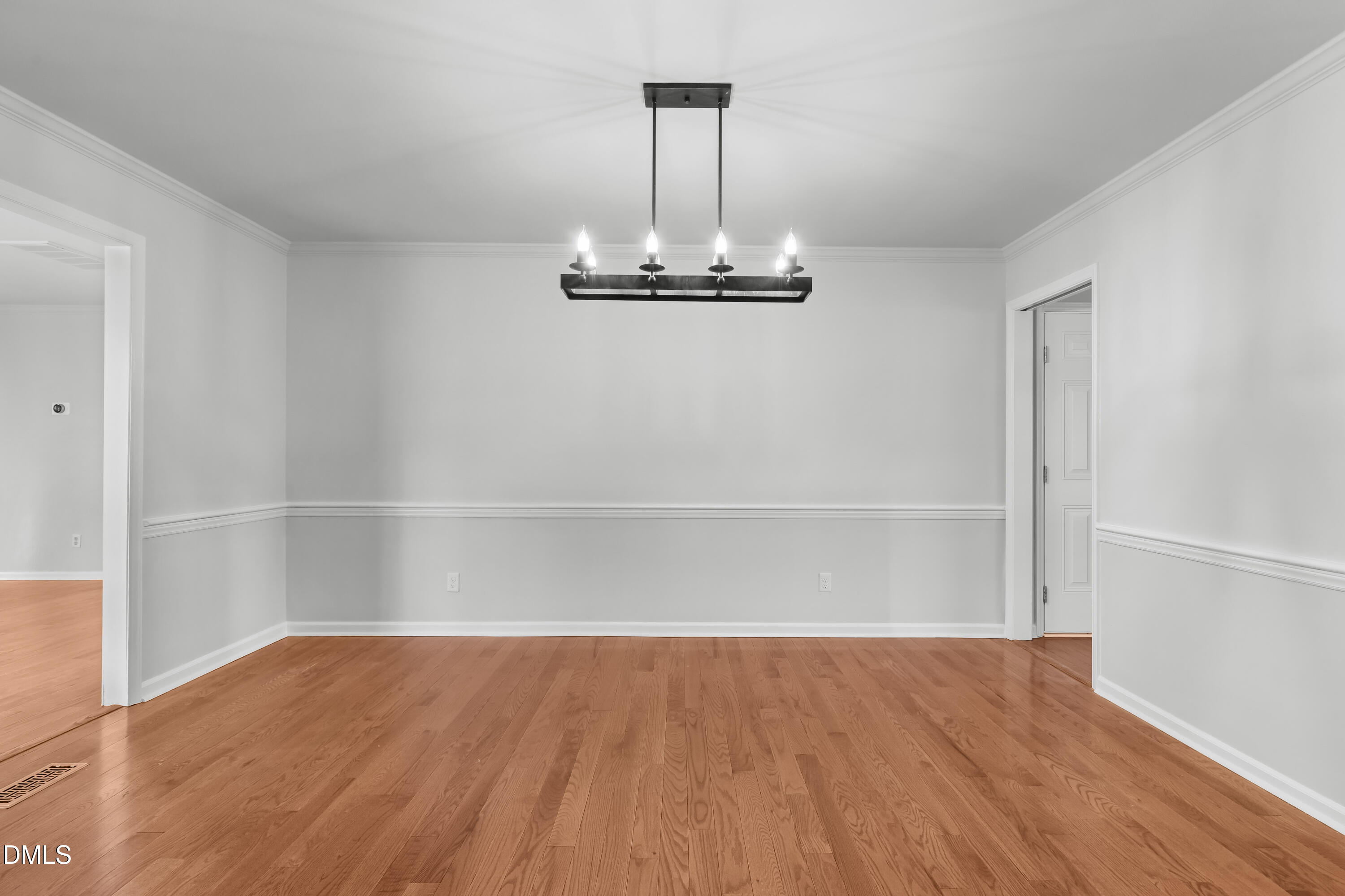 3504 Fairhill Drive Raleigh, NC 27612 - Photo 8 of 45 a view of a room with wooden floor