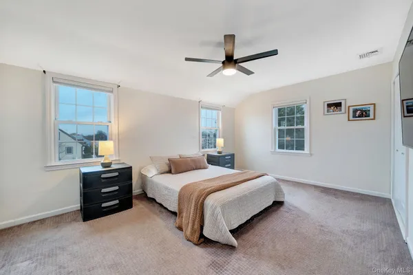 a bathroom with a sink toilet and mirror
