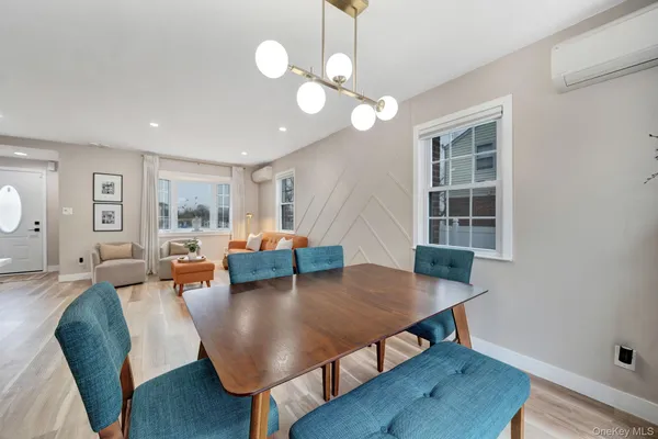 a living room with fireplace furniture and a flat screen tv