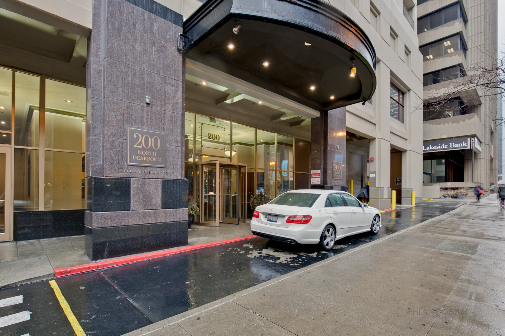 200 North Dearborn Street, Unit 1908 Chicago, IL 60601 - Photo 2 of 23 a car parked on the side of a street