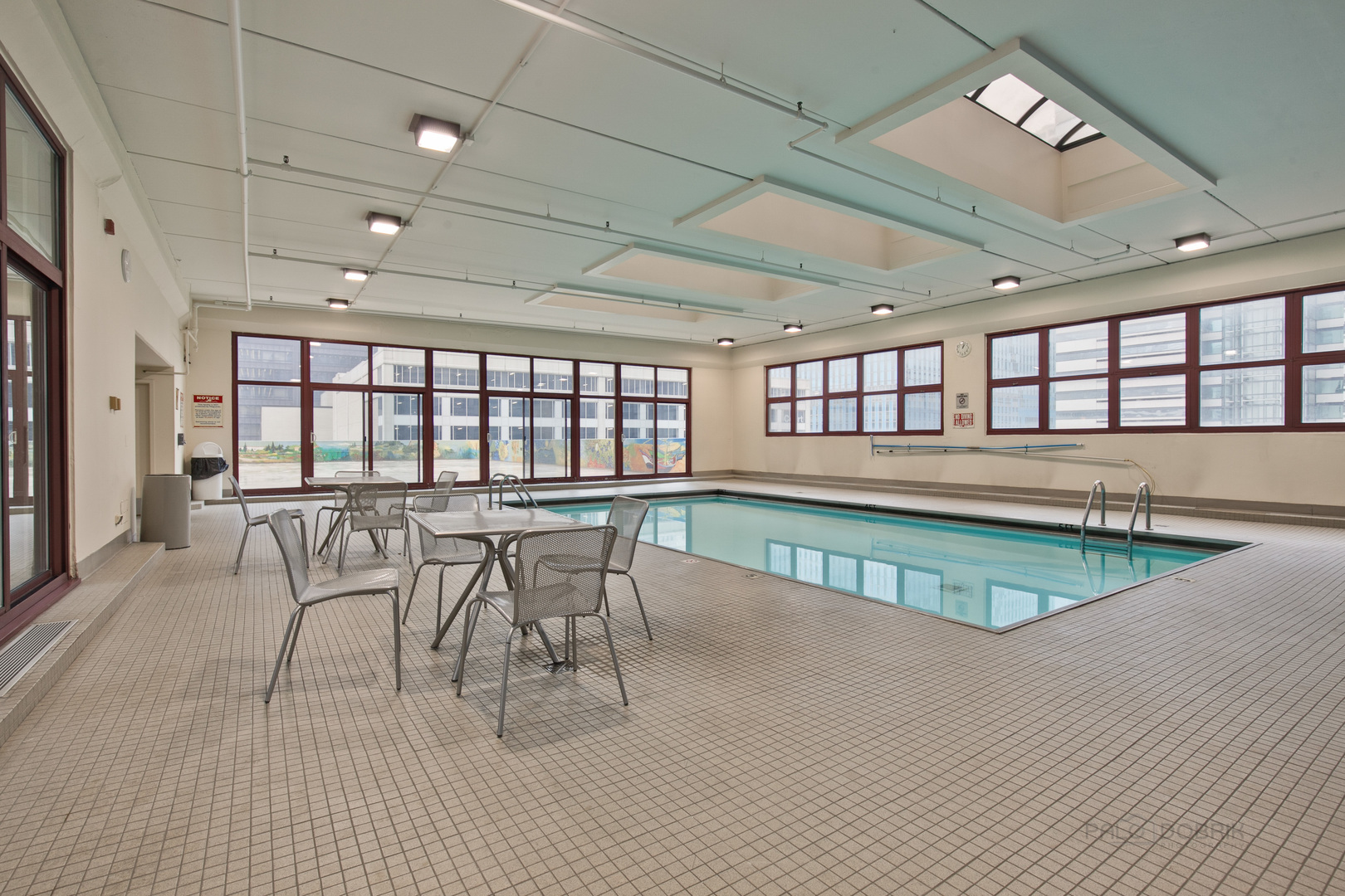 200 North Dearborn Street, Unit 1908 Chicago, IL 60601 - Photo 9 of 23 a view of a room with lots of furniture and window