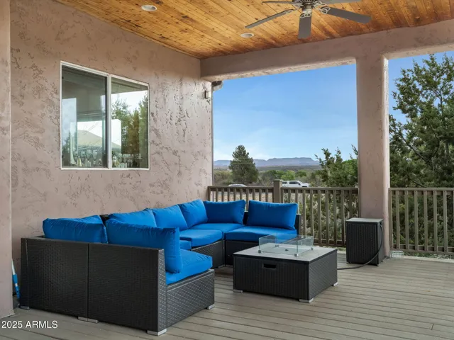 a blue bench sitting in front of a house