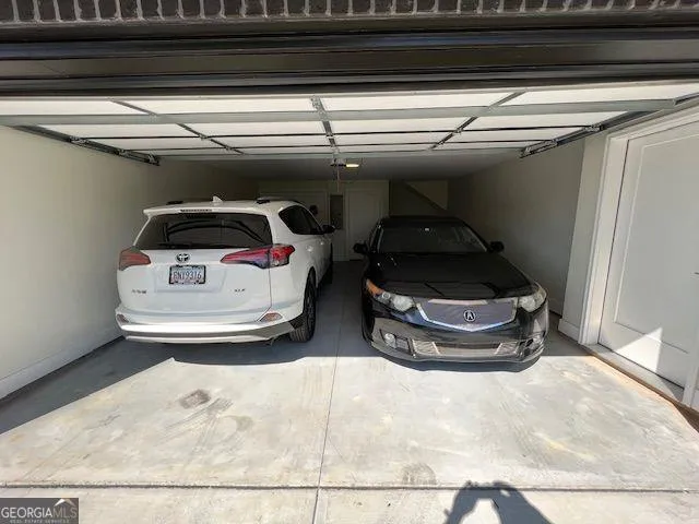 a bathroom with a mirror and a sink