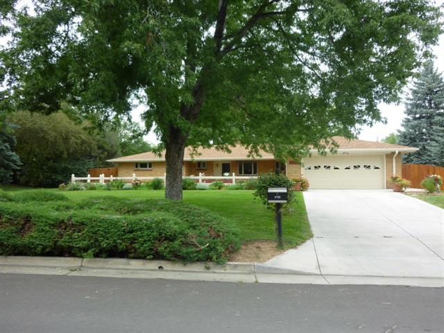 2725 Crabapple Road Golden, CO 80401 - Photo 1 of 1 a front view of a house with a yard