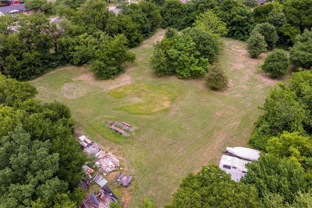 1007 West Belt Line Road Cedar Hill, TX 75104 - Photo 27 of 30 Expansive land parcel featuring open grassy areas and mature tree coverage