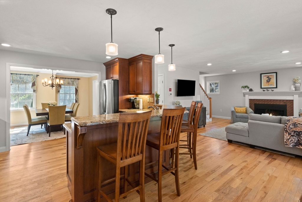 145 River Street Middleton, MA 01949 - Photo 13 of 42 a view of a dining room with furniture window and wooden floor