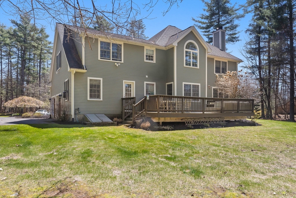 145 River Street Middleton, MA 01949 - Photo 36 of 42 a front view of a house with a yard