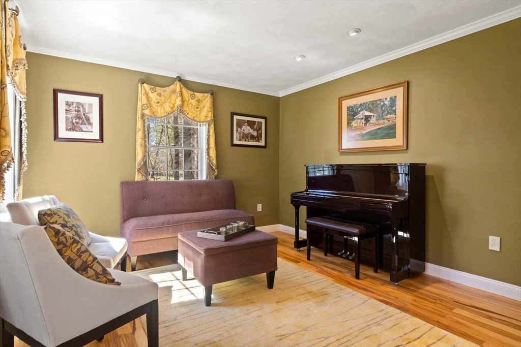 145 River Street Middleton, MA 01949 - Photo 4 of 42 a living room with furniture and a piano