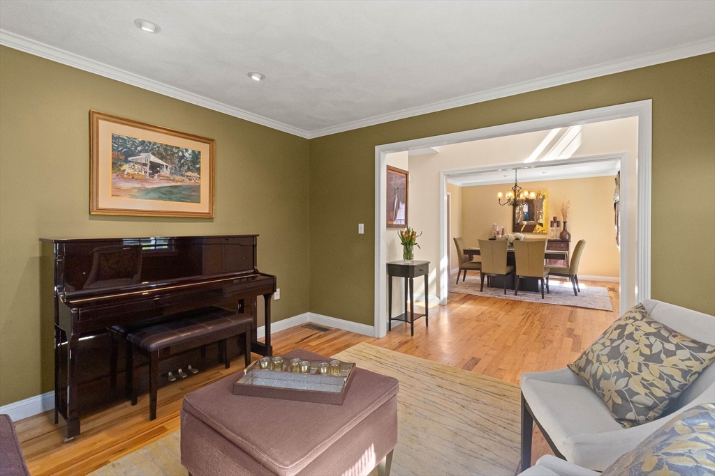 145 River Street Middleton, MA 01949 - Photo 5 of 42 a living room with furniture and a piano