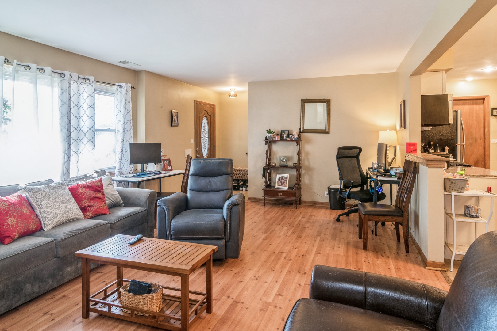 24 North Delaplaine Road Riverside, IL 60546 - Photo 4 of 11 a living room with furniture and a large window