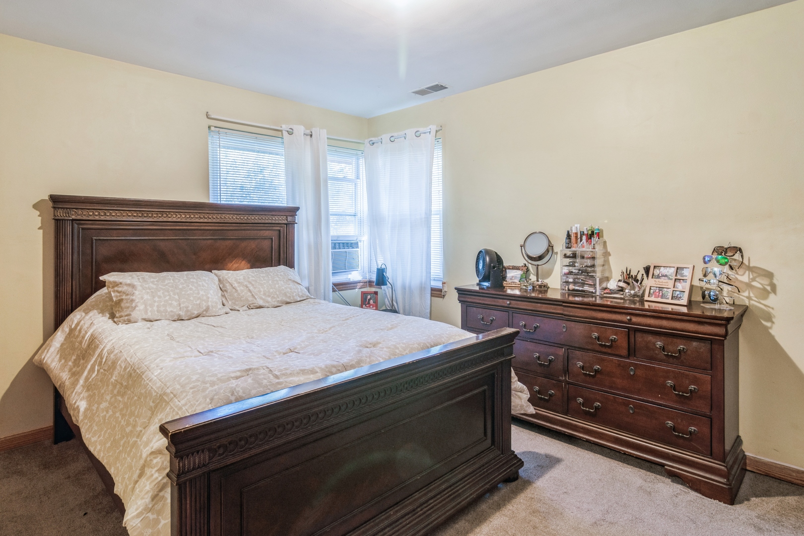 24 North Delaplaine Road Riverside, IL 60546 - Photo 7 of 11 a bedroom with a bed and a dresser