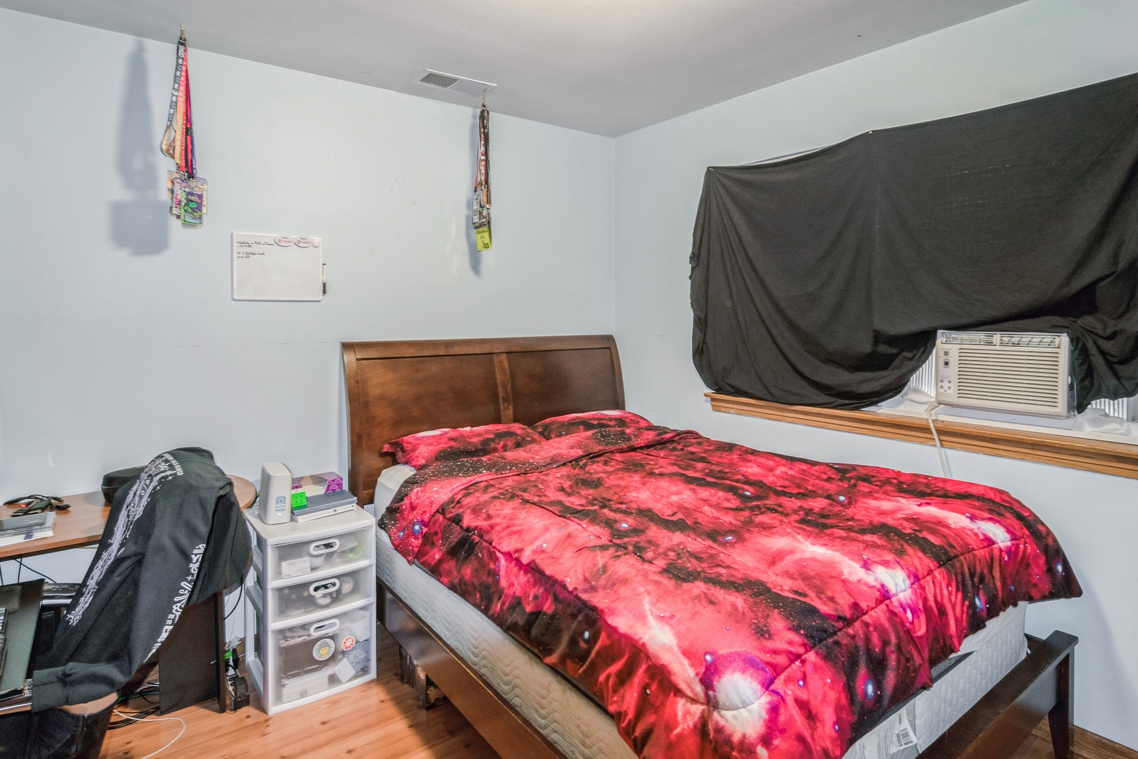 24 North Delaplaine Road Riverside, IL 60546 - Photo 8 of 11 a bedroom with a bed and a painting on the wall