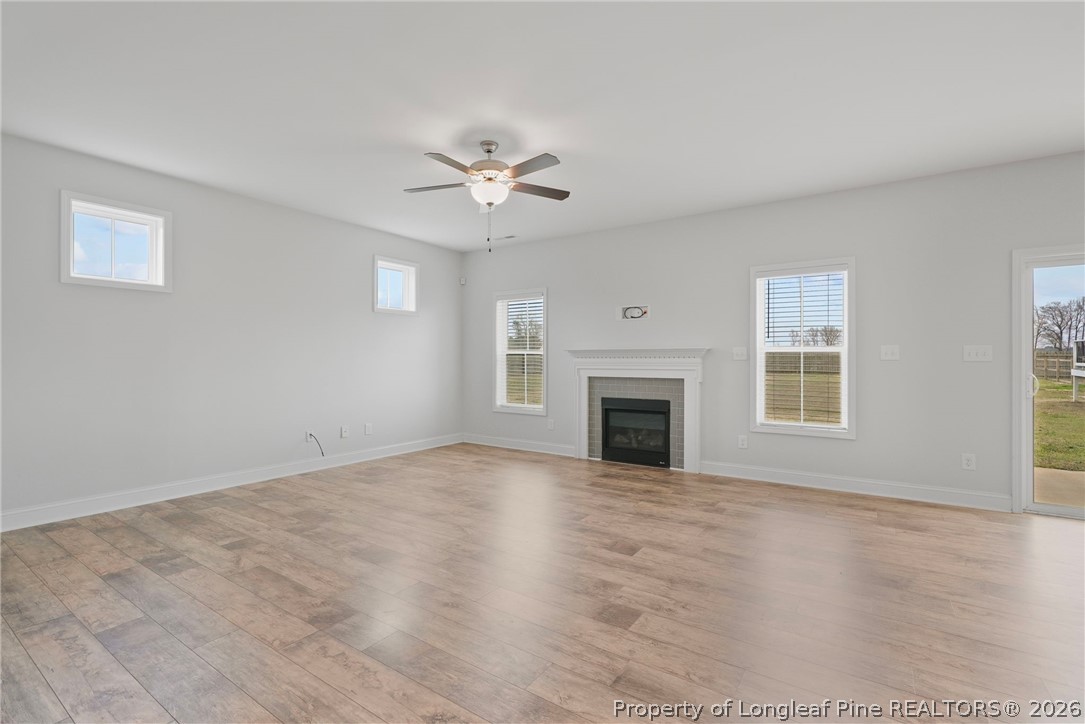 5150 J T Matthews Road Godwin, NC 28344 - Photo 15 of 50 a view of empty room with fireplace