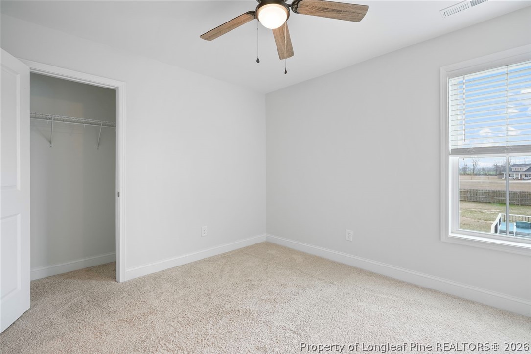 5150 J T Matthews Road Godwin, NC 28344 - Photo 39 of 50 an empty room with a window