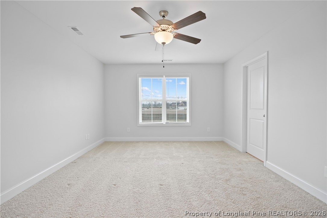 5150 J T Matthews Road Godwin, NC 28344 - Photo 41 of 50 a view of an empty room with a window