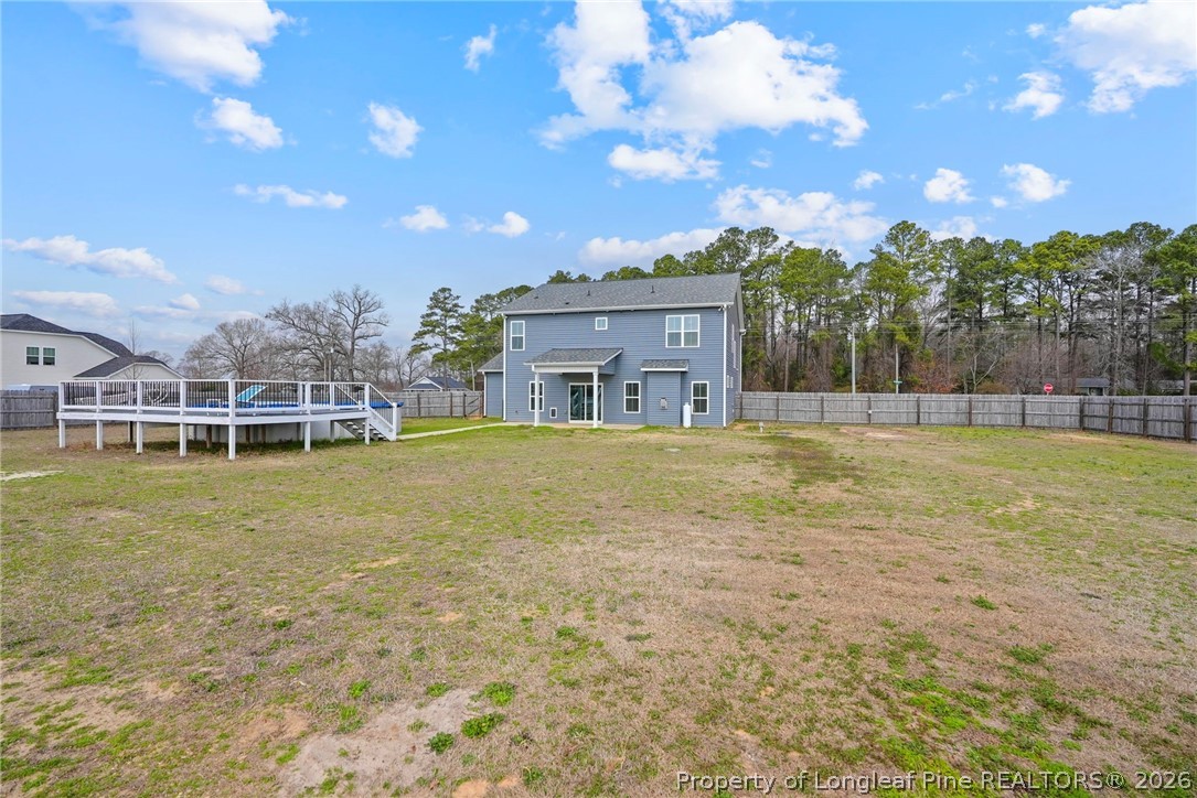 5150 J T Matthews Road Godwin, NC 28344 - Photo 45 of 50 a view of a house with a big yard