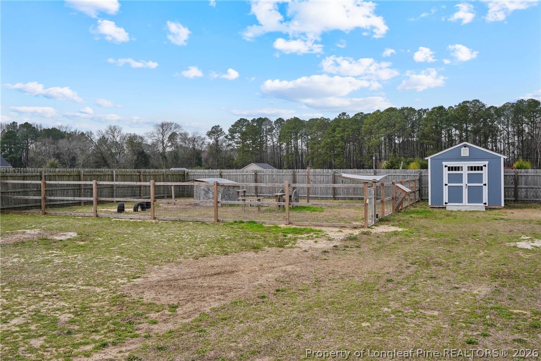 5150 J T Matthews Road Godwin, NC 28344 - Photo 46 of 50 a view of a yard with a large tree