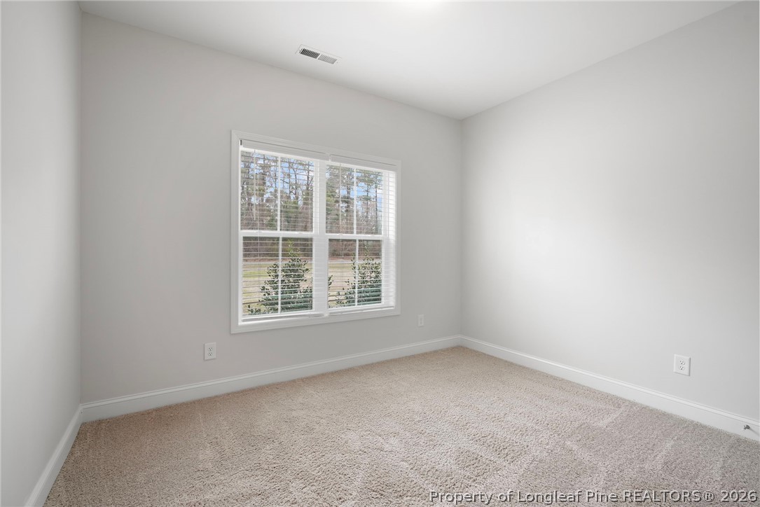 5150 J T Matthews Road Godwin, NC 28344 - Photo 9 of 50 an empty room with a window