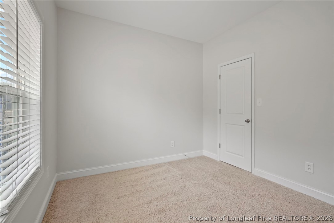 5150 J T Matthews Road Godwin, NC 28344 - Photo 10 of 50 an empty room with a window