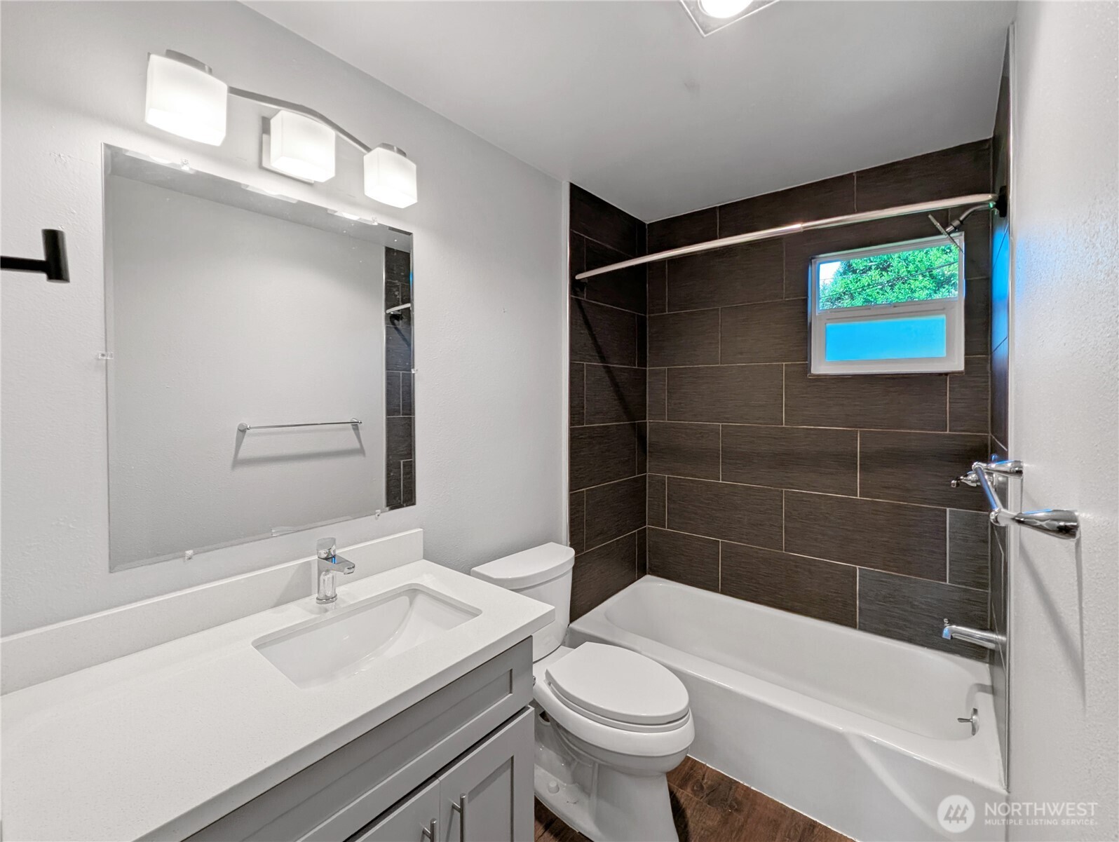 5954 Fauntleroy Way Southwest Seattle, WA 98136 - Photo 16 of 17 a bathroom with a sink a toilet and shower