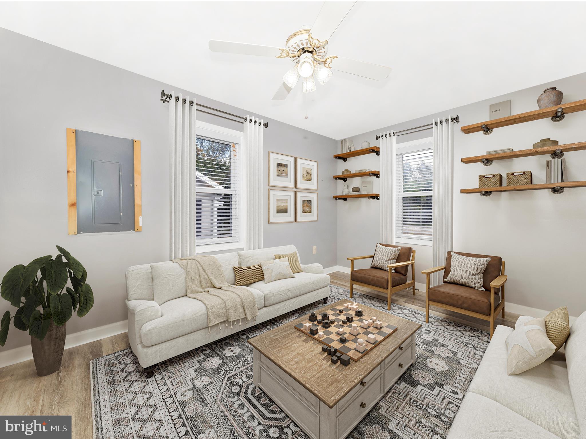9320 Rocky Ridge Road Rocky Ridge, MD 21778 - Photo 12 of 54 a living room with furniture a rug and a window