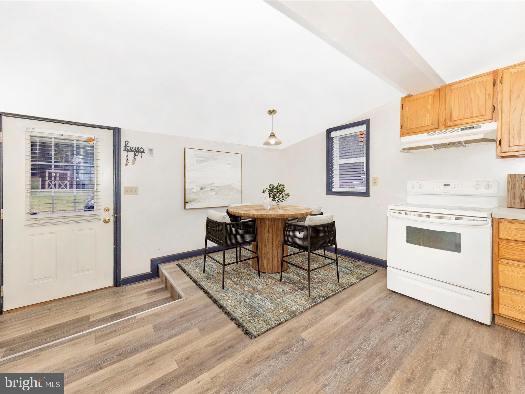 9320 Rocky Ridge Road Rocky Ridge, MD 21778 - Photo 20 of 54 a view of a dining room with furniture and wooden floor