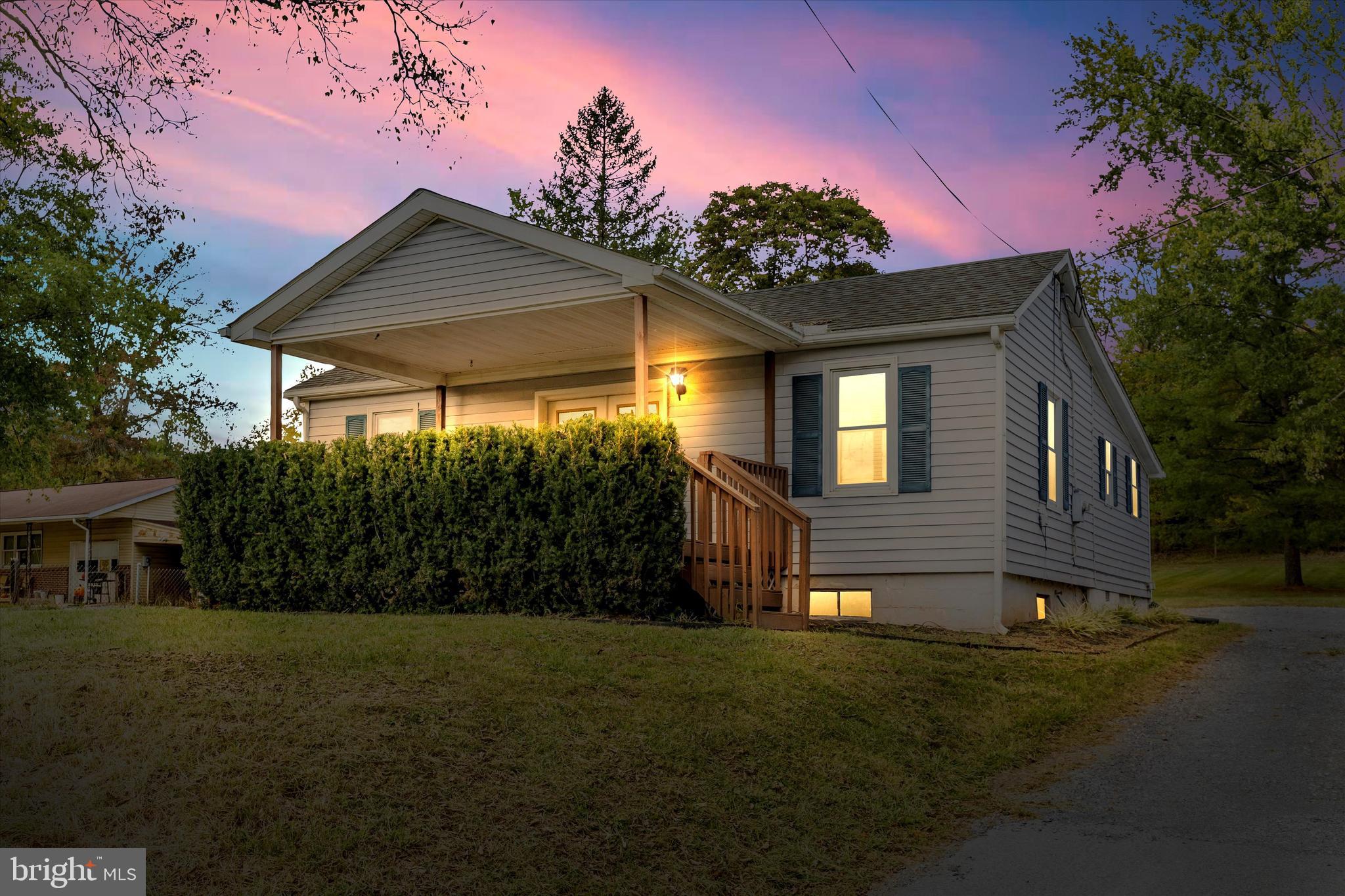 9320 Rocky Ridge Road Rocky Ridge, MD 21778 - Photo 2 of 54 a front view of a house with a yard