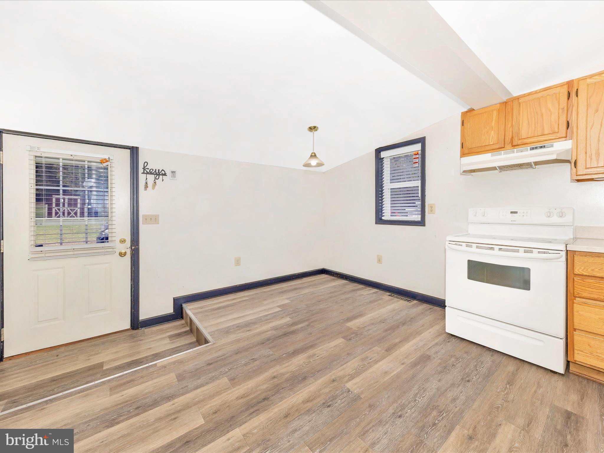 9320 Rocky Ridge Road Rocky Ridge, MD 21778 - Photo 21 of 54 a view of a storage & utility room with wooden floor