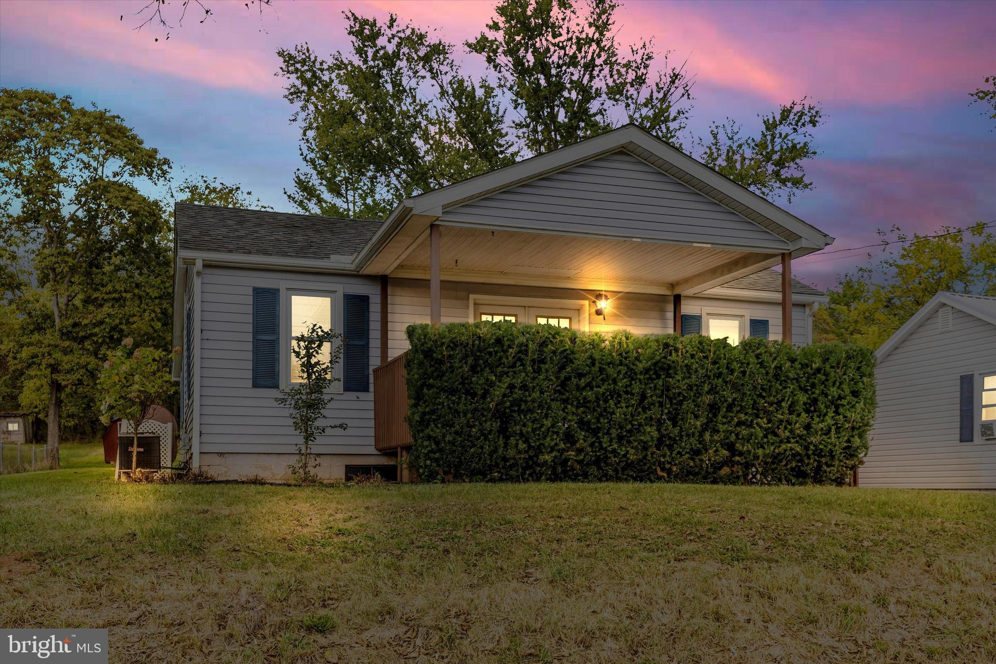 9320 Rocky Ridge Road Rocky Ridge, MD 21778 - Photo 3 of 54 a front view of a house with a yard