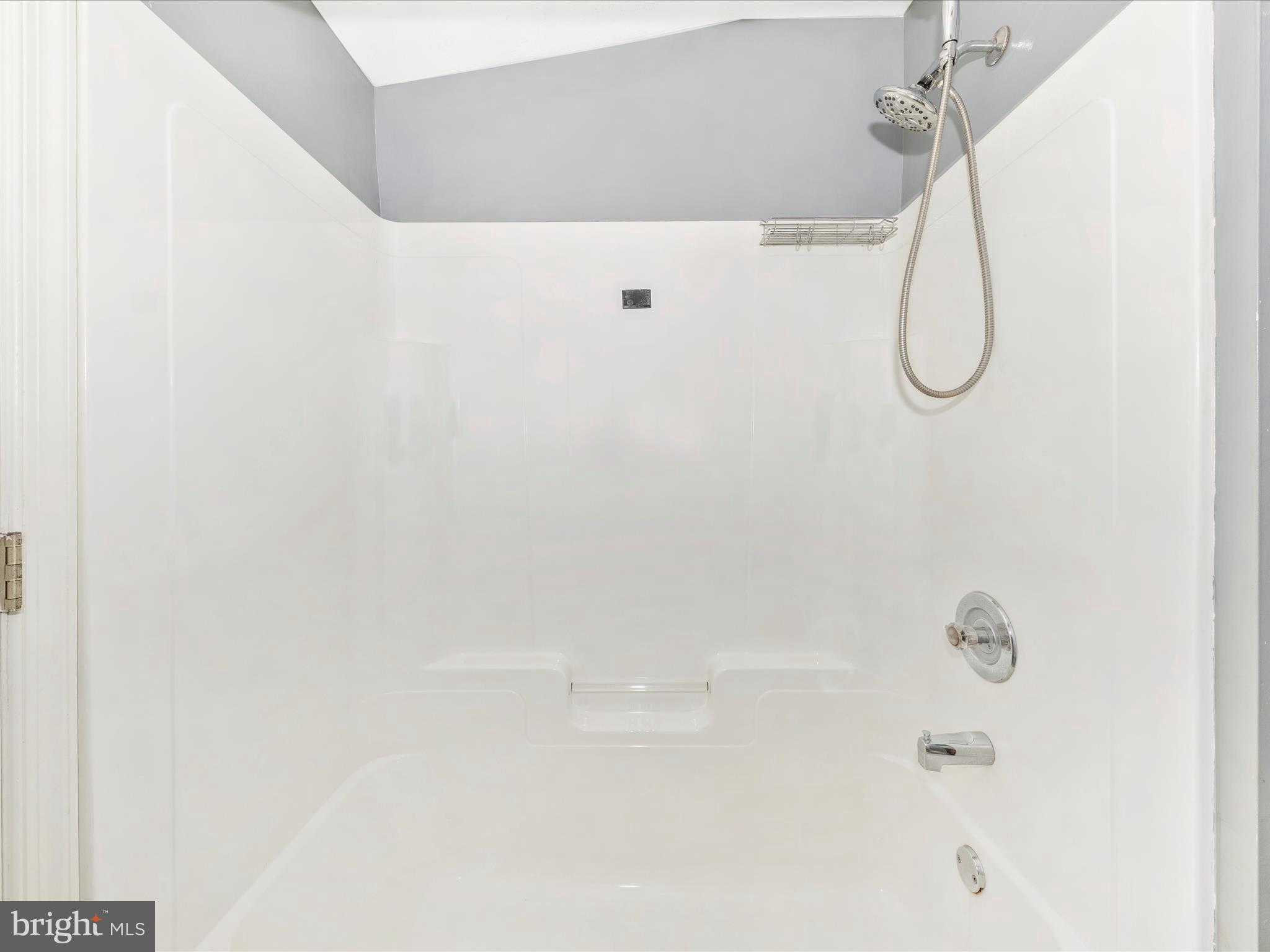 9320 Rocky Ridge Road Rocky Ridge, MD 21778 - Photo 34 of 54 a bathroom with a glass shower door