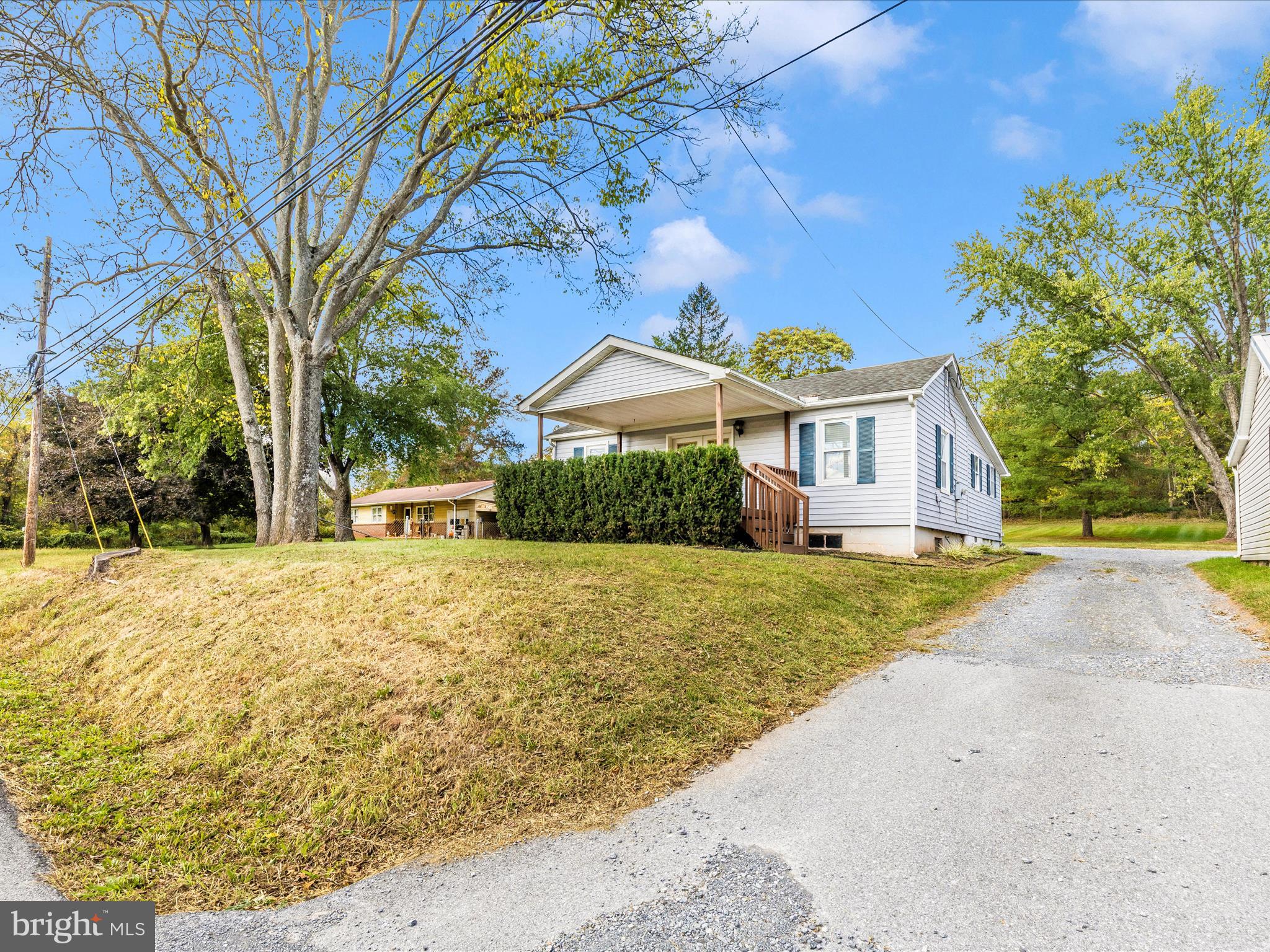 9320 Rocky Ridge Road Rocky Ridge, MD 21778 - Photo 41 of 54 a front view of a house with garden