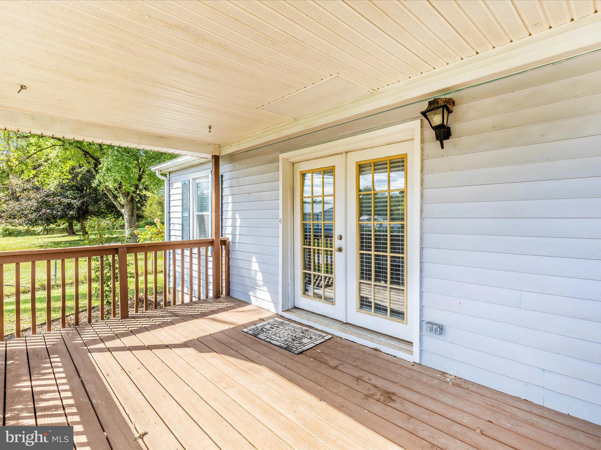 9320 Rocky Ridge Road Rocky Ridge, MD 21778 - Photo 44 of 54 a view of a balcony with wooden floor
