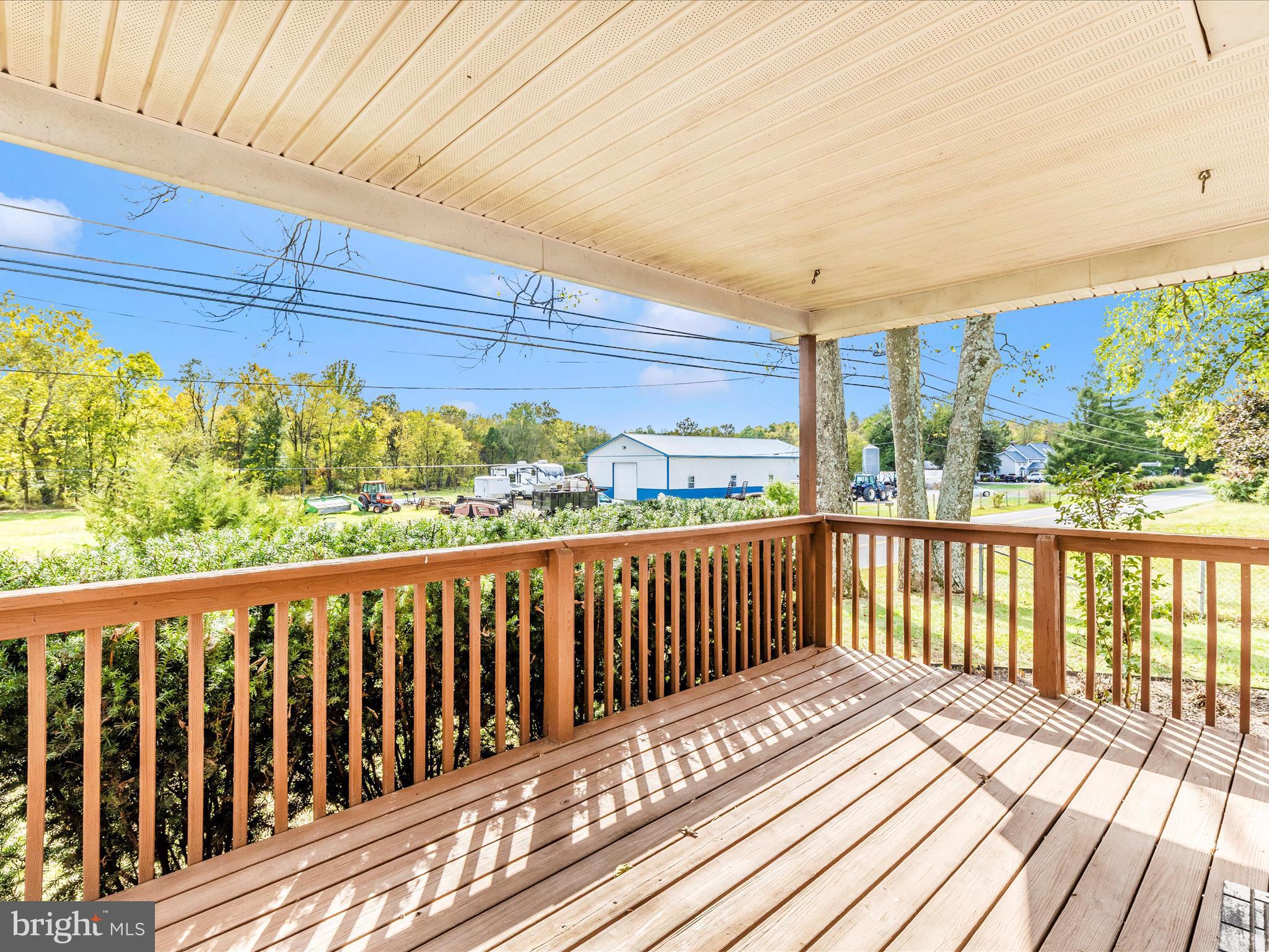 9320 Rocky Ridge Road Rocky Ridge, MD 21778 - Photo 45 of 54 a view of balcony with wooden floor