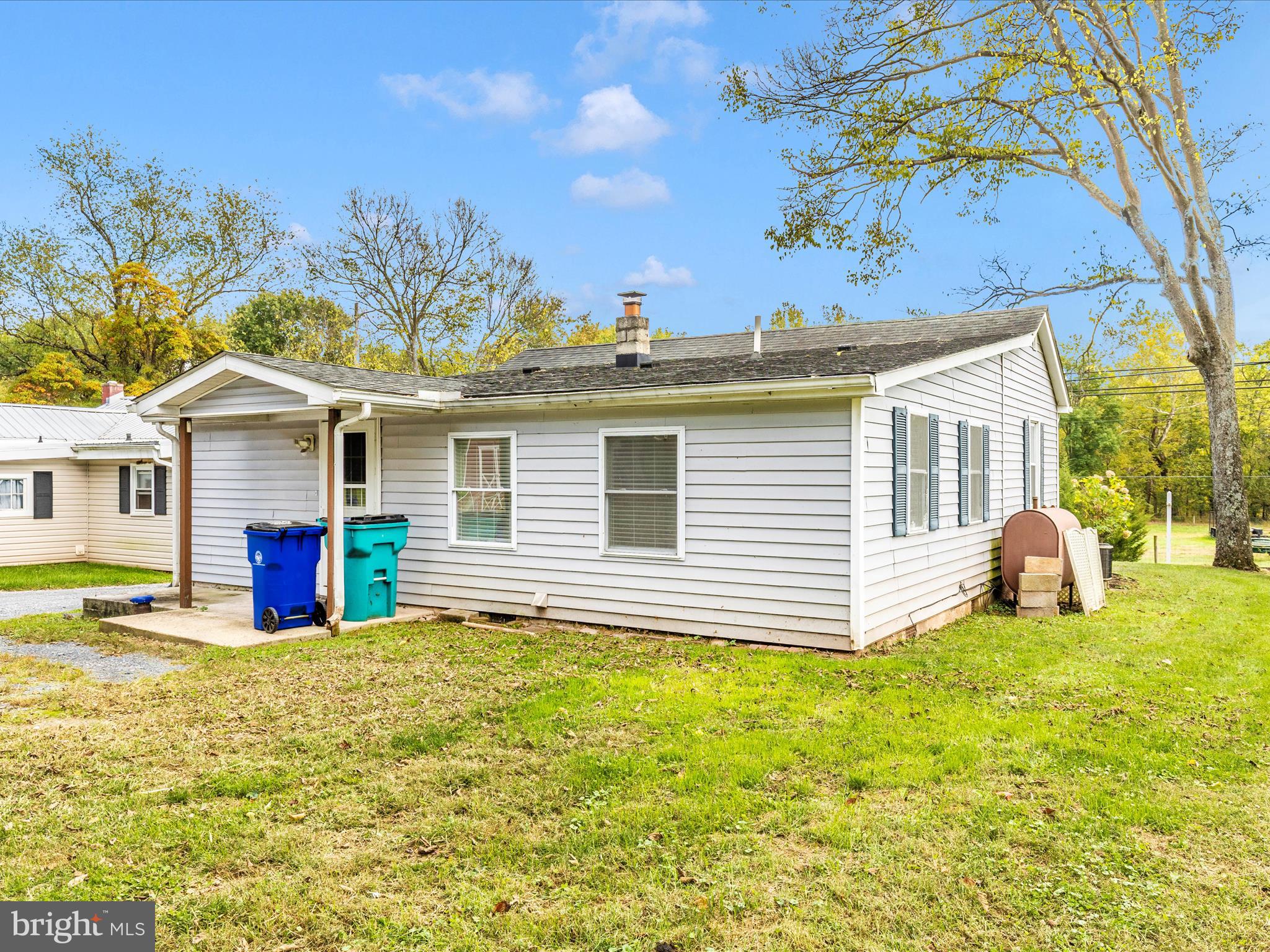 9320 Rocky Ridge Road Rocky Ridge, MD 21778 - Photo 48 of 54 a view of a house with a patio and a yard