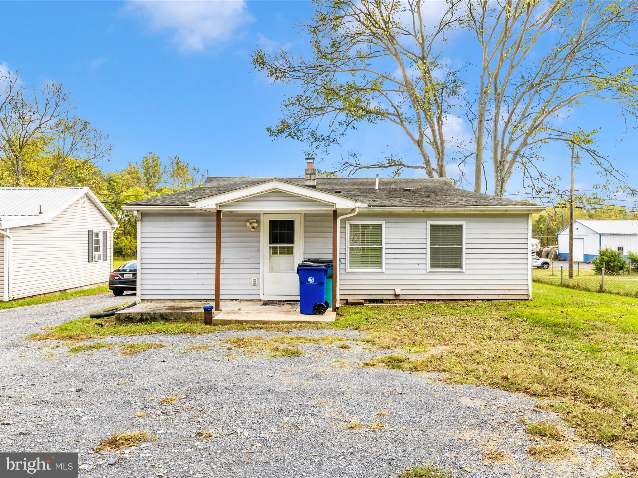 9320 Rocky Ridge Road Rocky Ridge, MD 21778 - Photo 49 of 54 a view of a house with backyard and sitting area